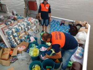 Imagem da notícia - Famílias de Anamã e mais nove municípios afetados pela enchente recebem ajuda humanitária da Defesa Civil do Amazonas